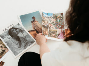 Joanna Southwell looking at moodboards as part of brand elevation editorial photoshoot planning