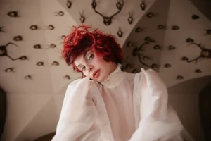 bride in a ruff style high neck wedding dress as part of a modern editorial photoshoot to elevate brand positioning