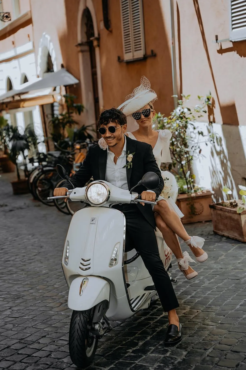 Modern bride styled by Joanna Southwell with her groom at a wedding in Italy -  captured at an editorial photoshoot