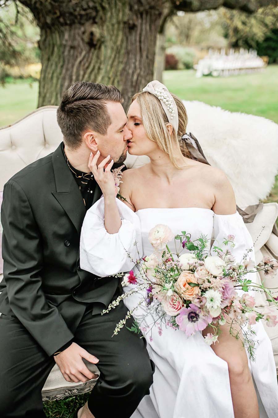 Modern bride styled by Joanna Southwell with her groom captured at an editorial photoshoot